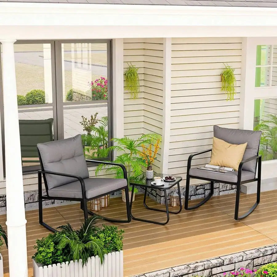 Three Piece Outdoor Rocking Bistro Set With Glass Coffee Table