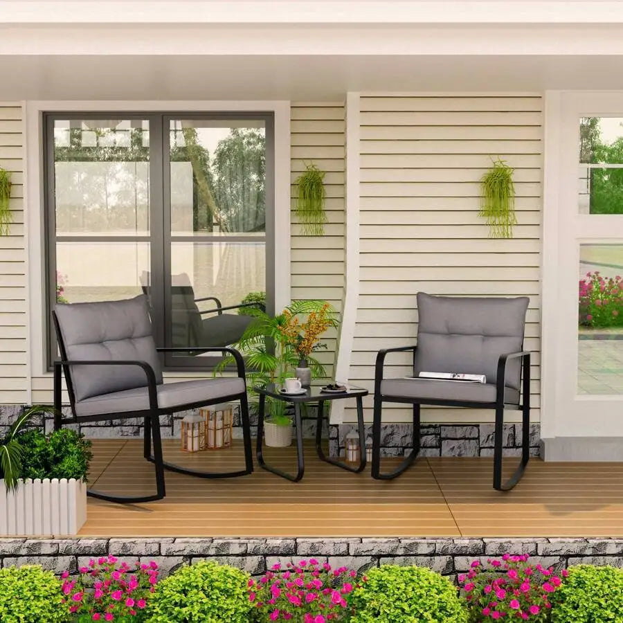 Three Piece Outdoor Rocking Bistro Set With Glass Coffee Table