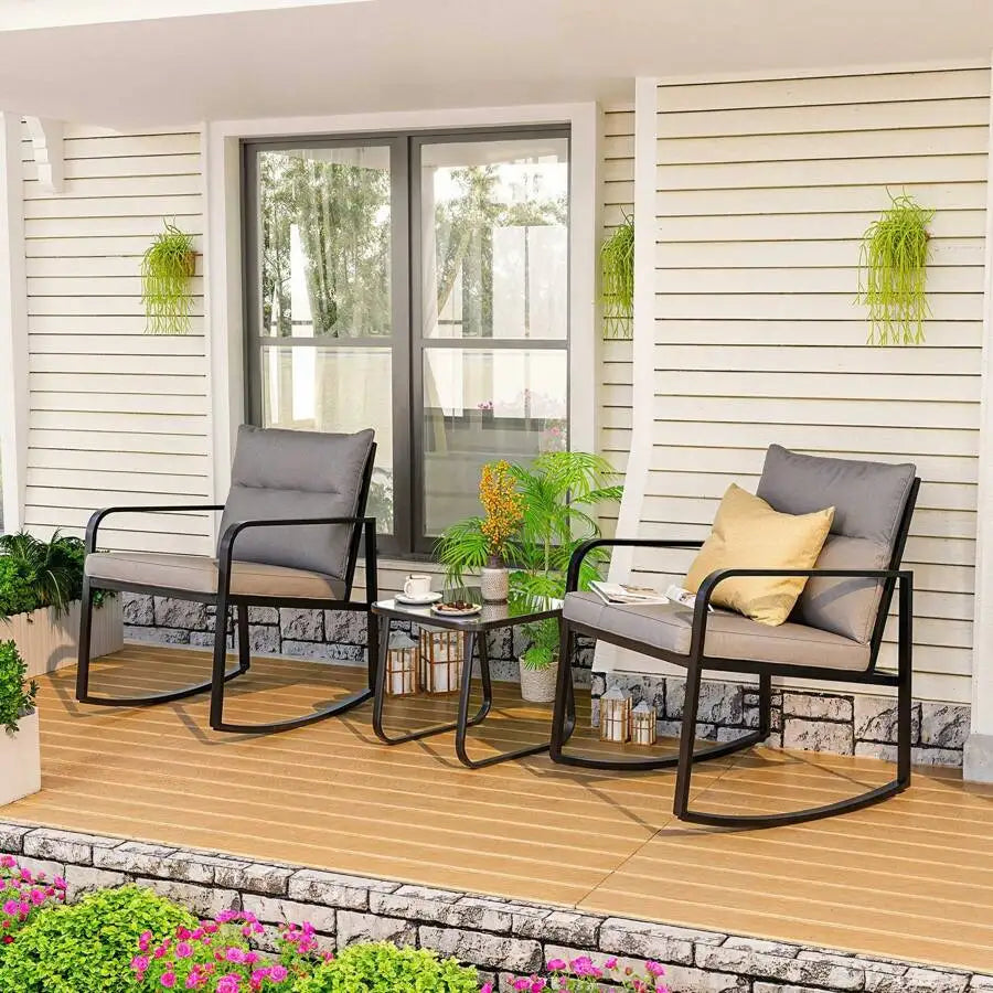 Three Piece Outdoor Rocking Bistro Set With Glass Coffee Table